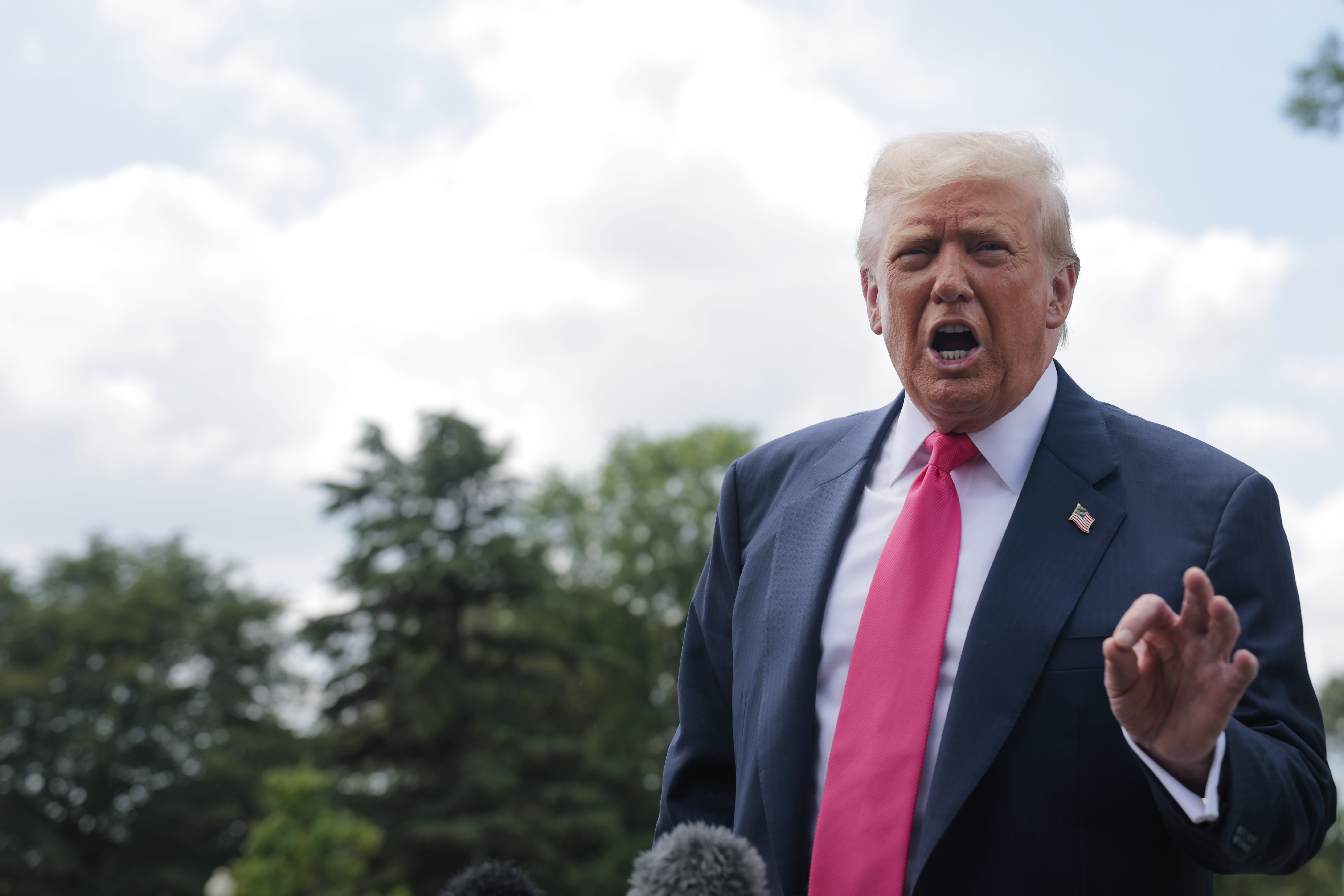 U.S. President Donald Trump speaks to the media as he departs the White House on July 15, 2025 in Washington, DC.