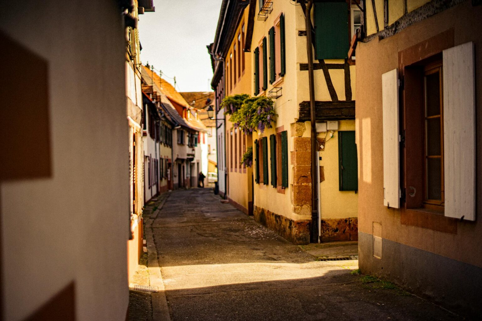 Empty main street in small rural town showing vacant storefronts and limited commercial activity