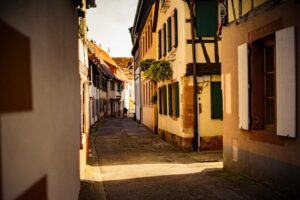 Empty main street in small rural town showing vacant storefronts and limited commercial activity