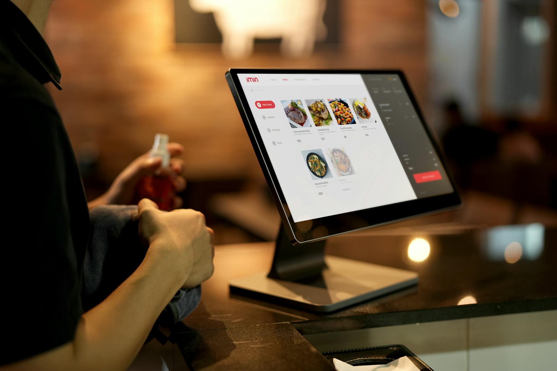 Modern fast casual restaurant counter with customers ordering food