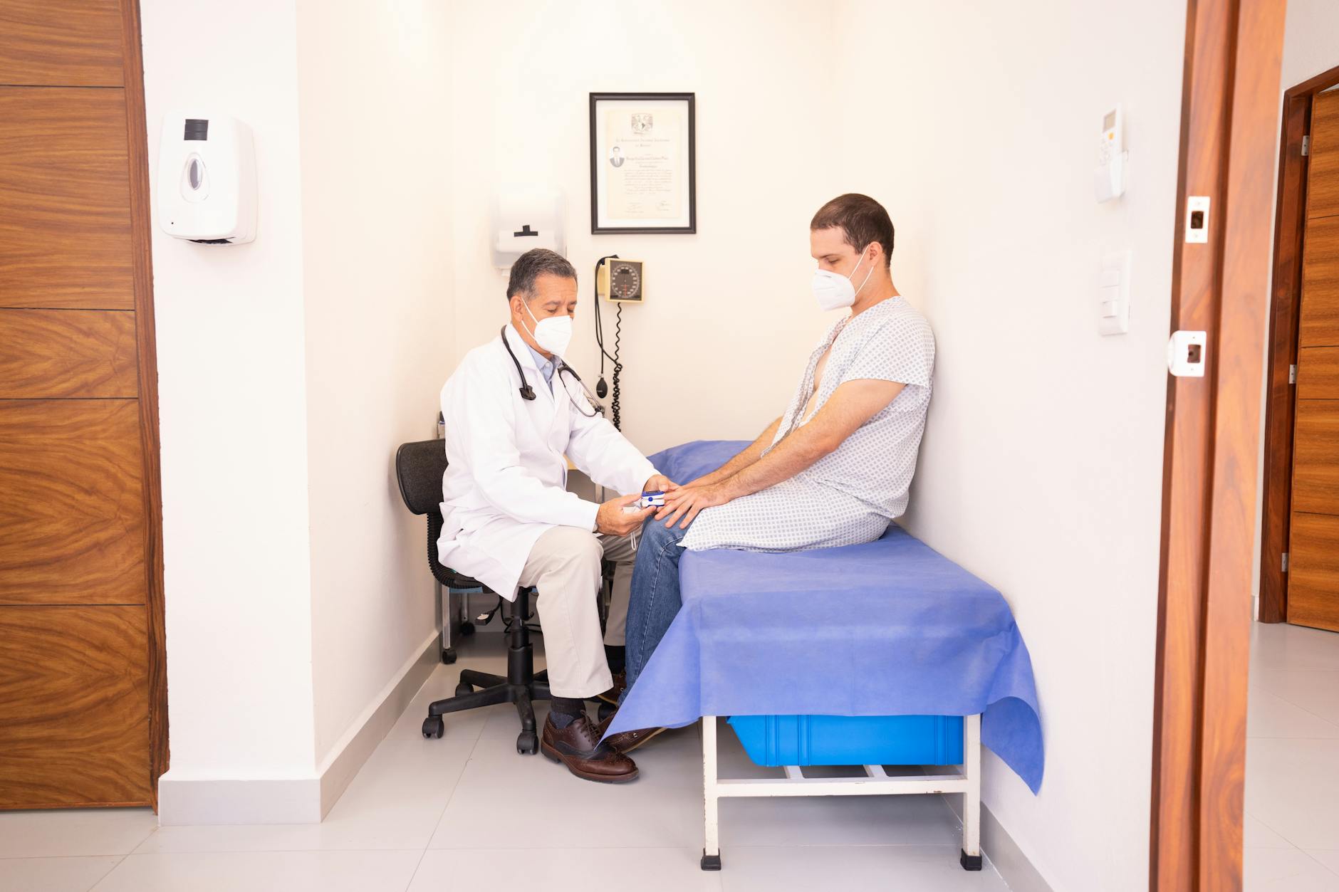 Modern medical clinic interior with examination room and medical equipment