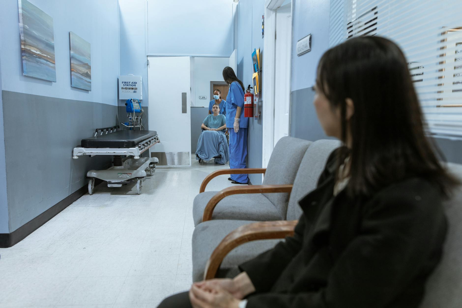 Modern hospital hallway representing healthcare system strain from mental health demand
