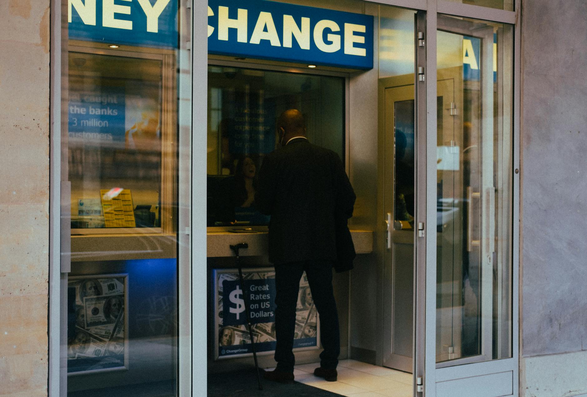 Modern bank interior with teller windows and professional banking environment