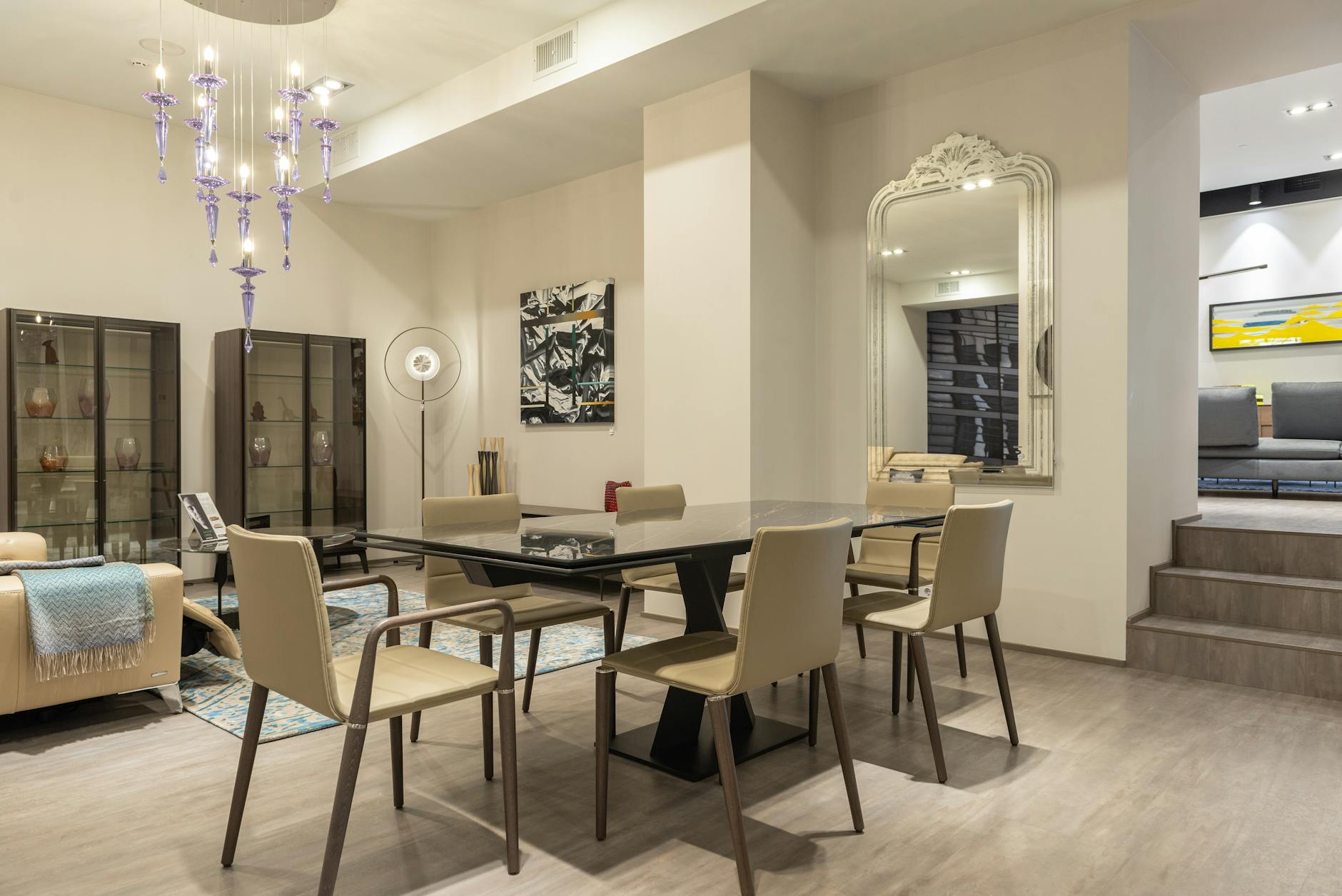 Modern furniture showroom with staged room displays and design samples