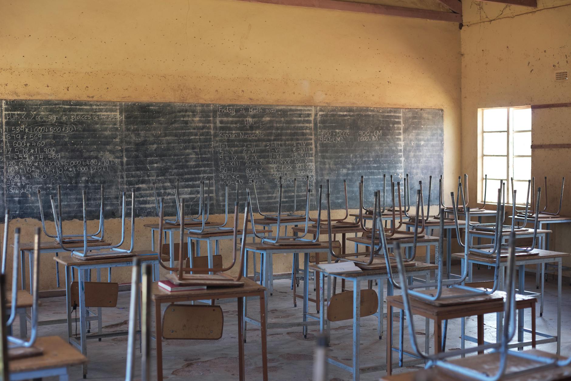 Empty classroom with small chairs, representing reduced childcare capacity and facility closures