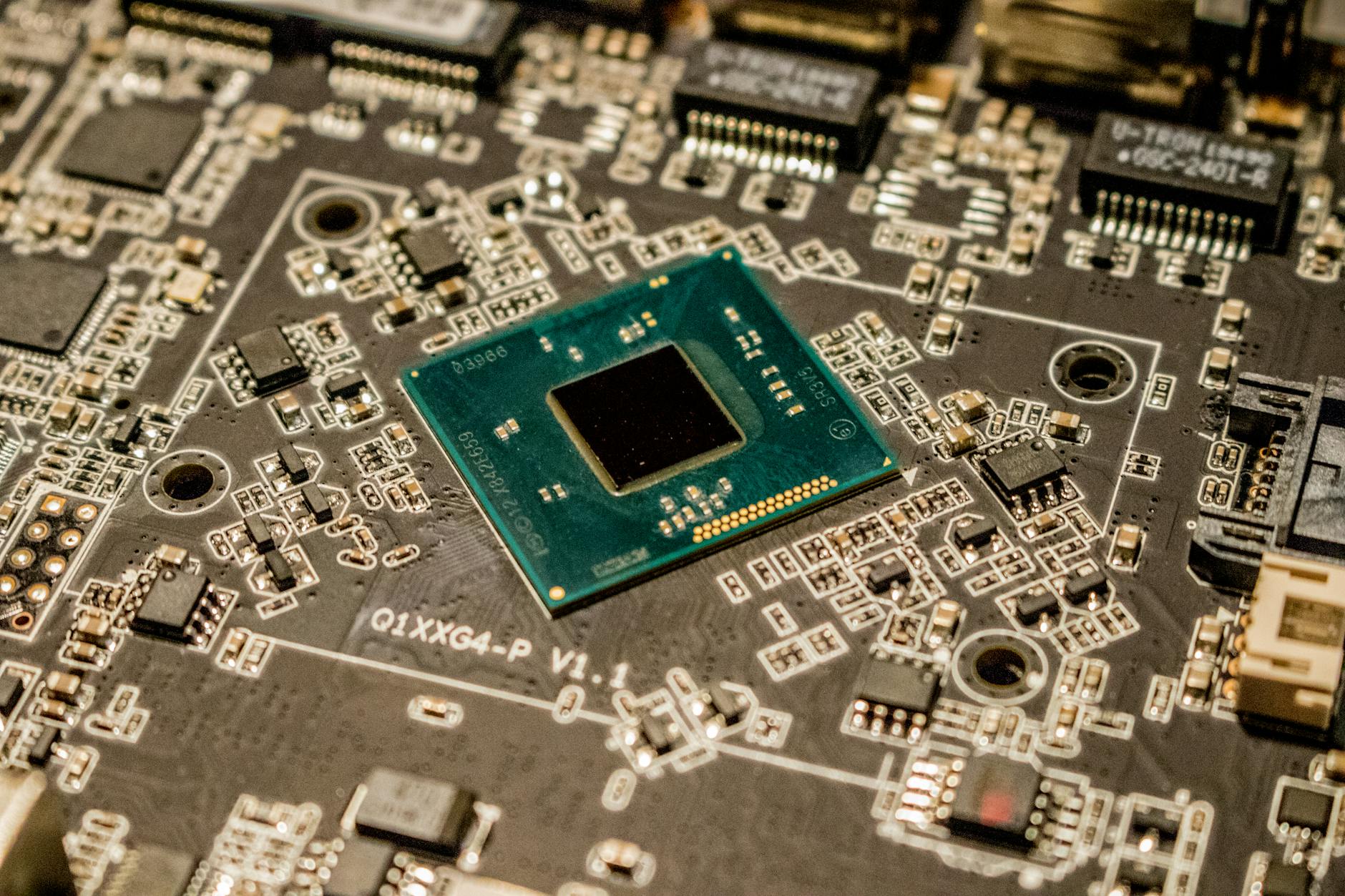 Close-up view of semiconductor chips and electronic components on circuit board