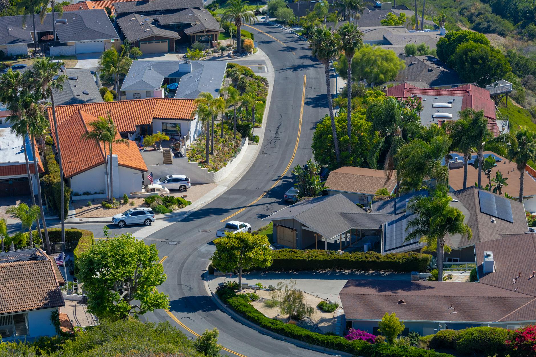 Suburban residential neighborhood with single-family homes and tree-lined streets