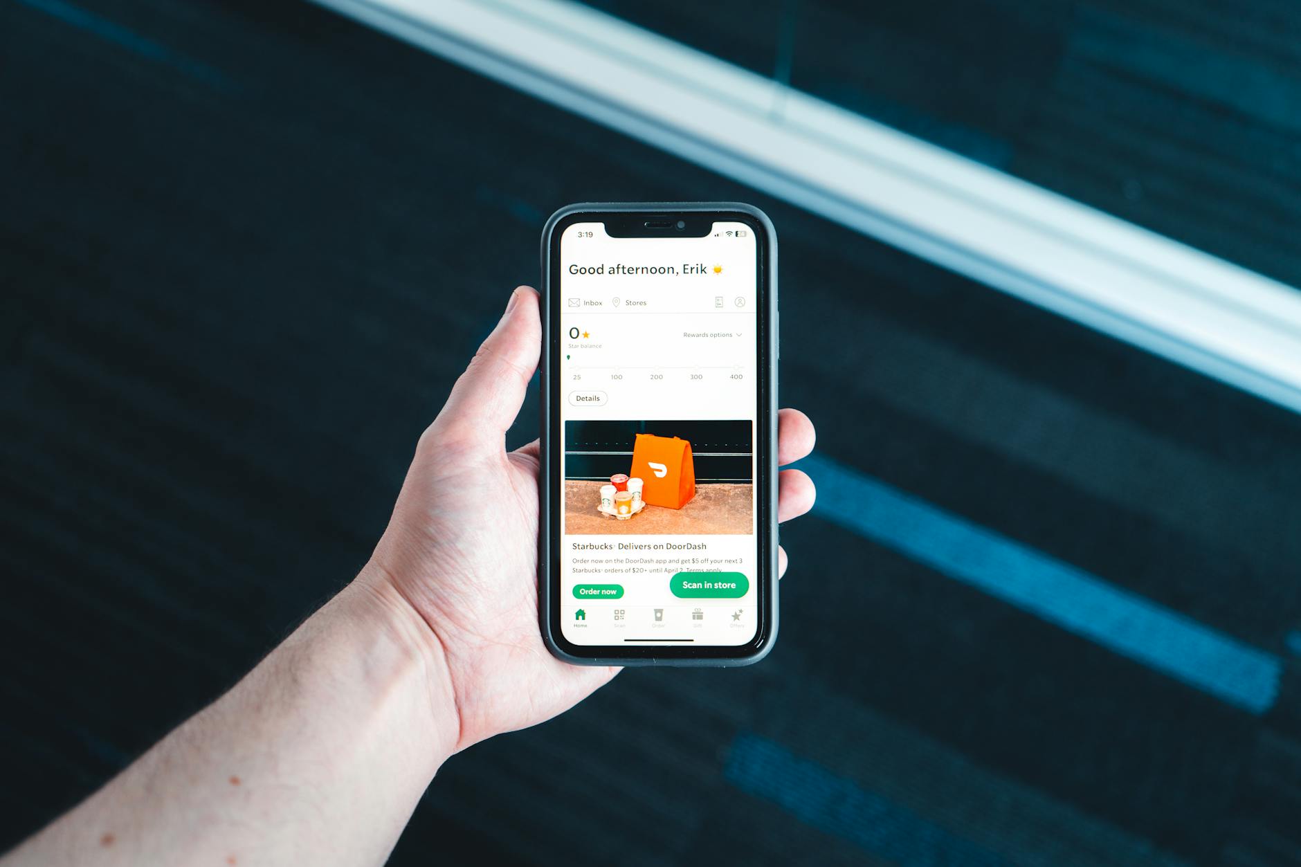 Person using smartphone to order food from restaurant app