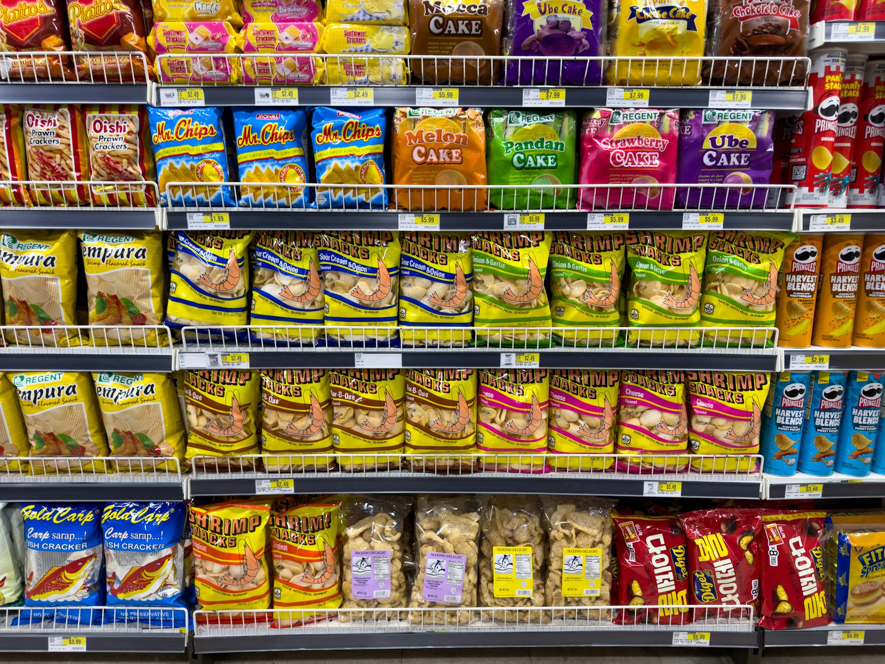 Customer shopping in modern food retail environment with prepared foods section