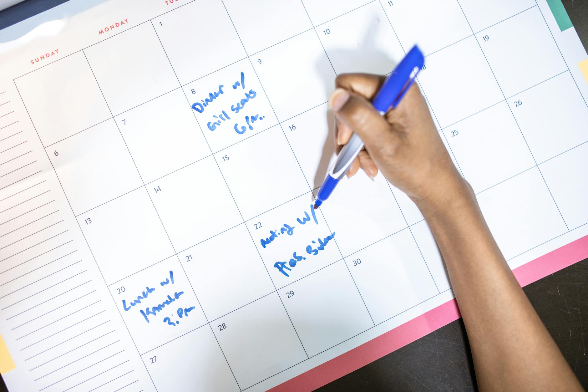 Business calendar and planning materials showing work schedule organization