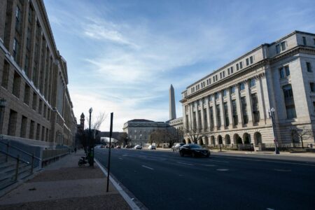 Federal Reserve building exterior with American flag