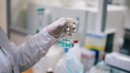 Scientists working in a modern biotechnology laboratory