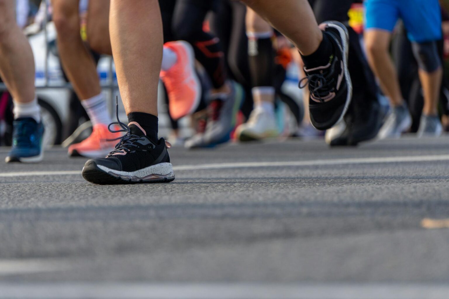 Marathon runners training on city street