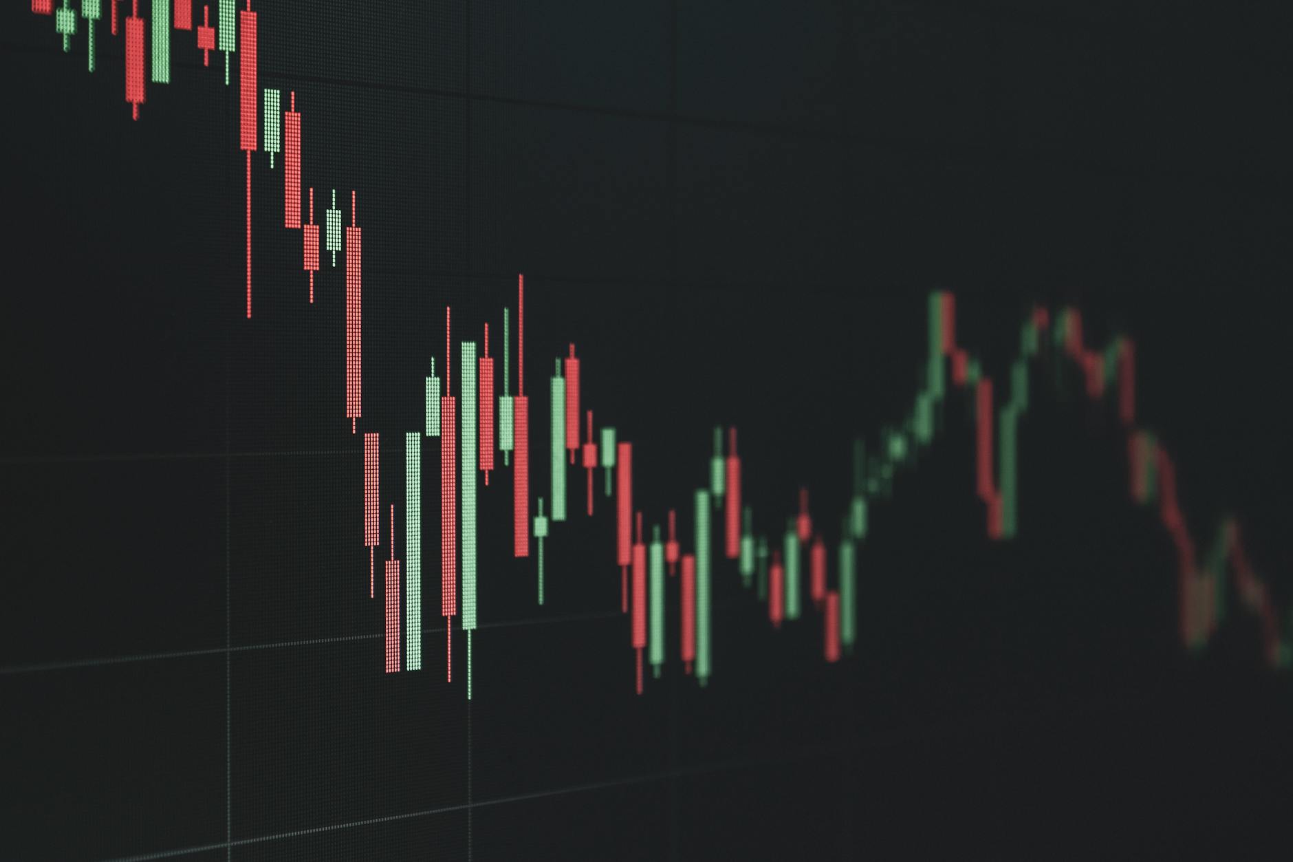 Red stock market chart showing declining prices and downward trend