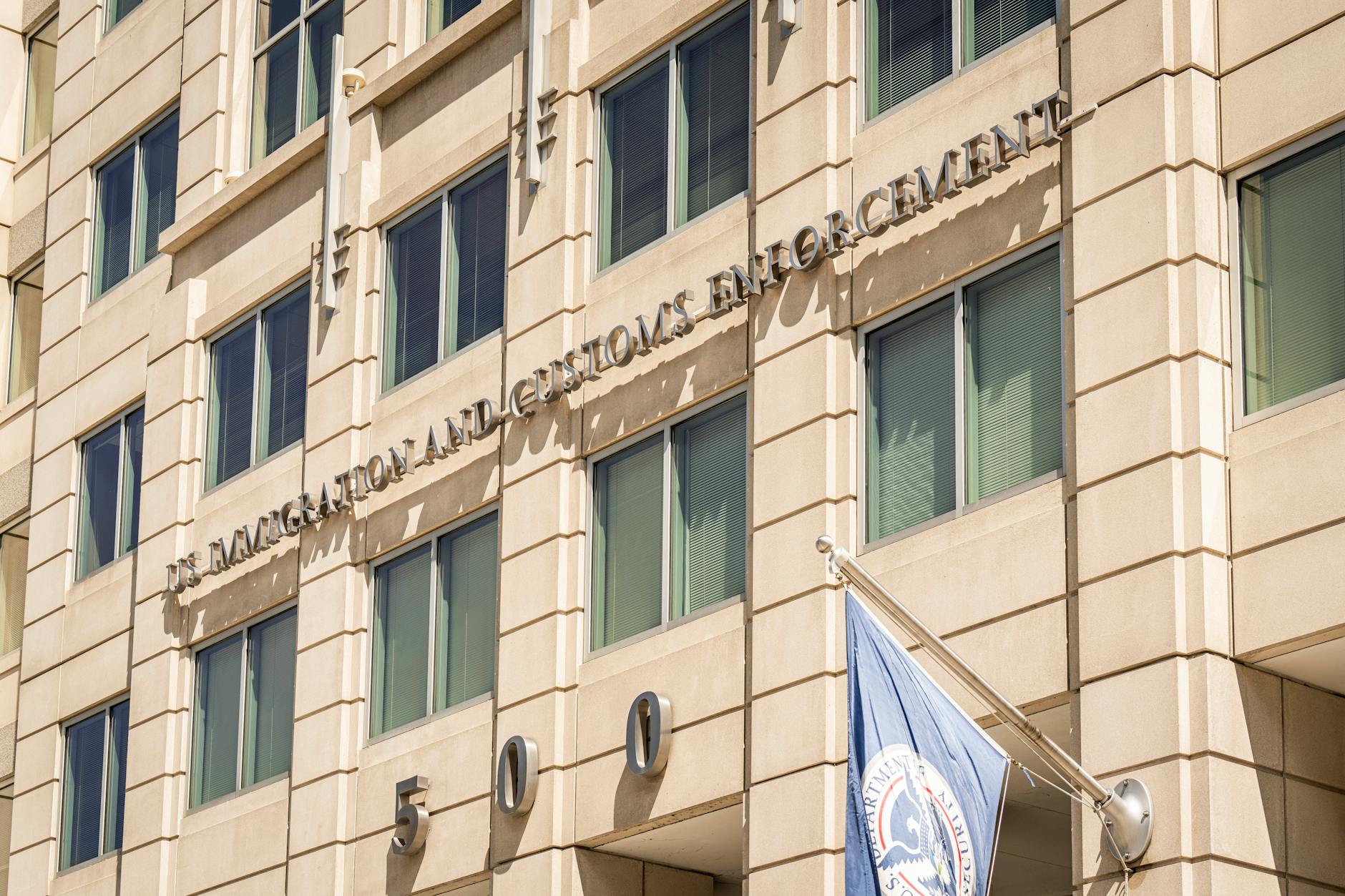 Federal government building representing institutional authority and political pressure