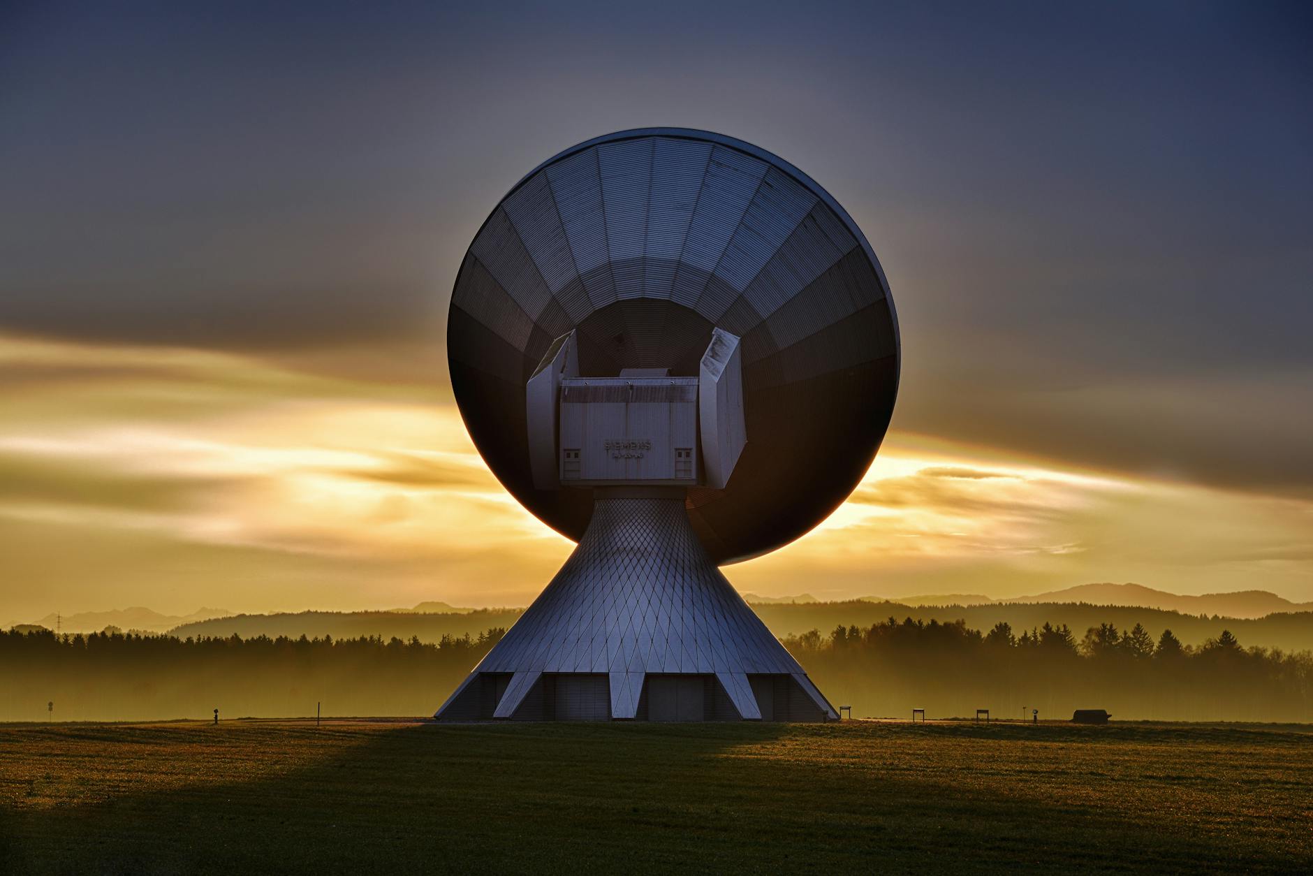 Satellite orbiting Earth against dark space background
