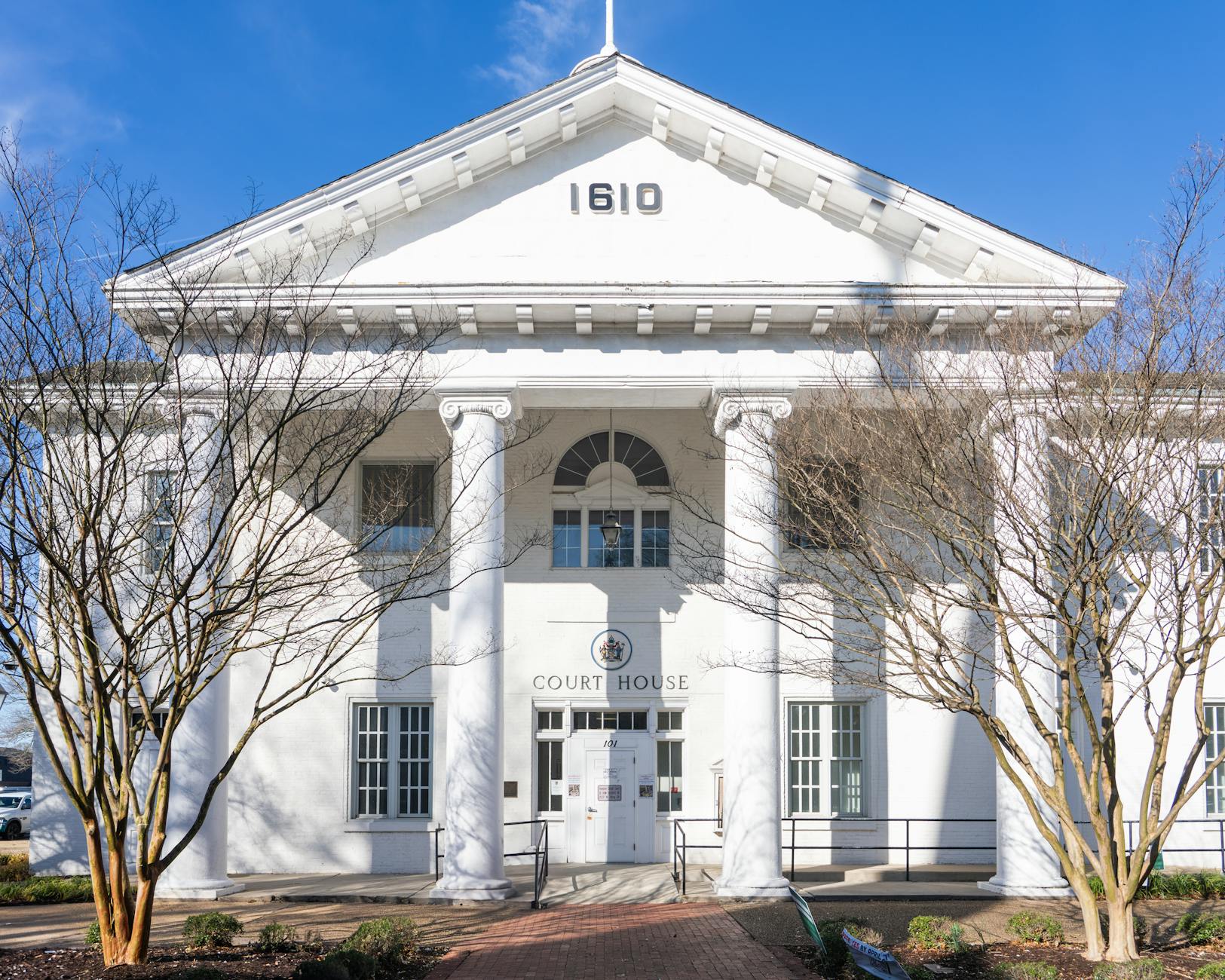 Modern courthouse building representing legal proceedings