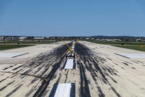 Commercial aircraft on airport runway during landing approach