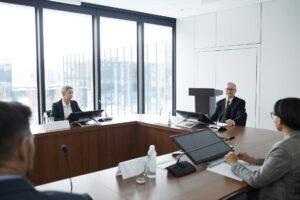 Business professionals in a corporate meeting room discussing strategy