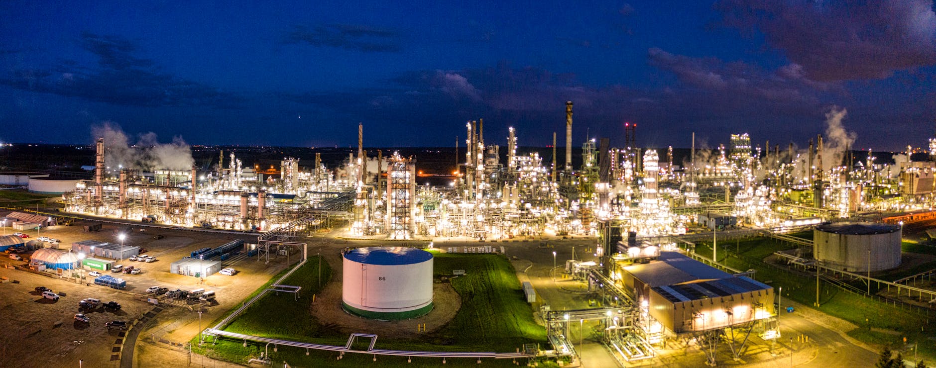 Industrial oil refinery with storage tanks and processing equipment
