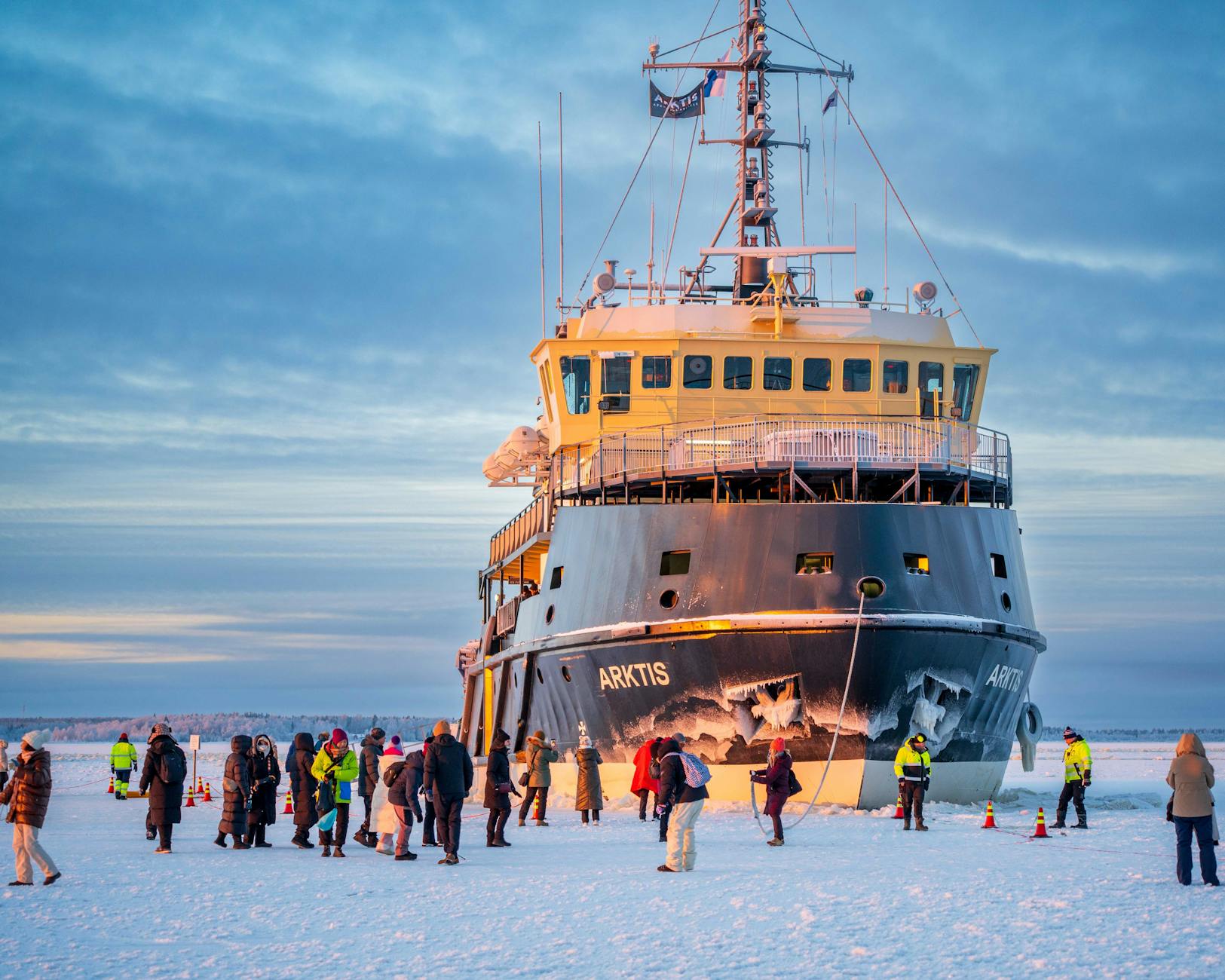 Expedition cruise ship navigating through icy polar waters