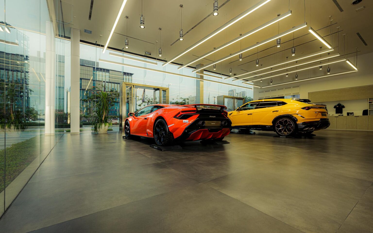 Empty car dealership showroom with vehicles on display
