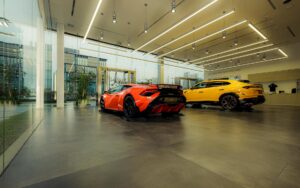 Empty car dealership showroom with vehicles on display