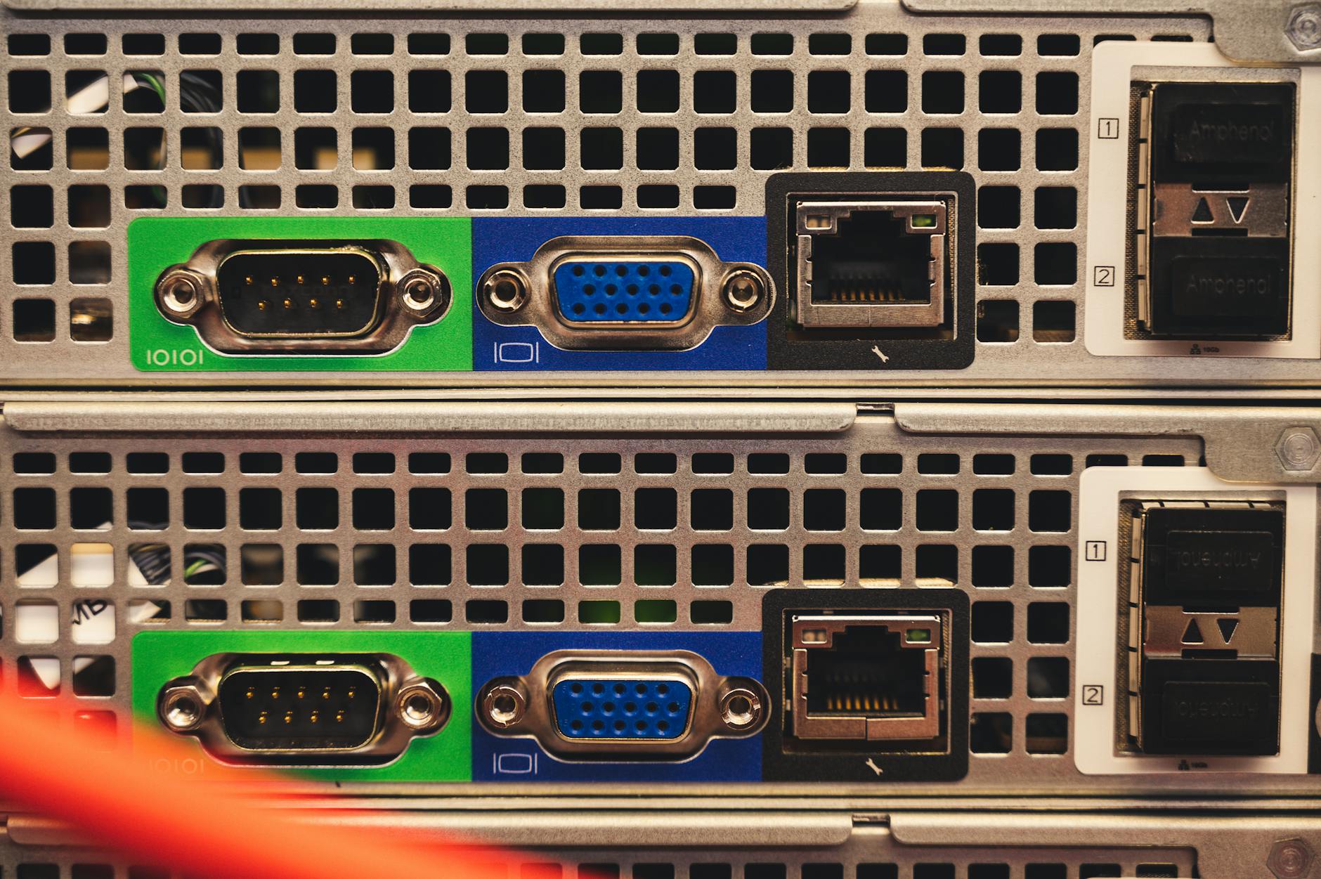 Rows of servers in a modern data center facility with blue lighting