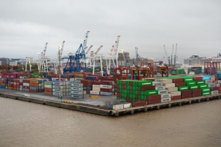 Large cargo ships docked at an international shipping port