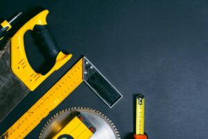 Construction tools and materials laid out for home repair project