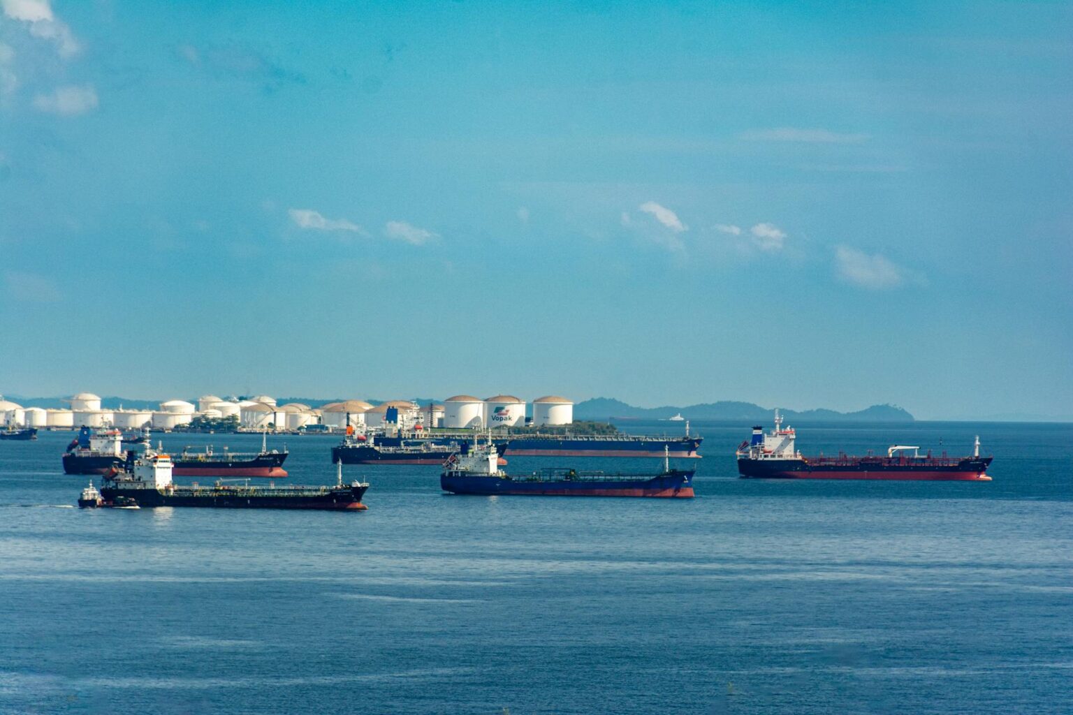 Tanker Strike Near UAE Port Highlights Mideast Shipping Risks Large oil tanker vessel navigating ocean waters