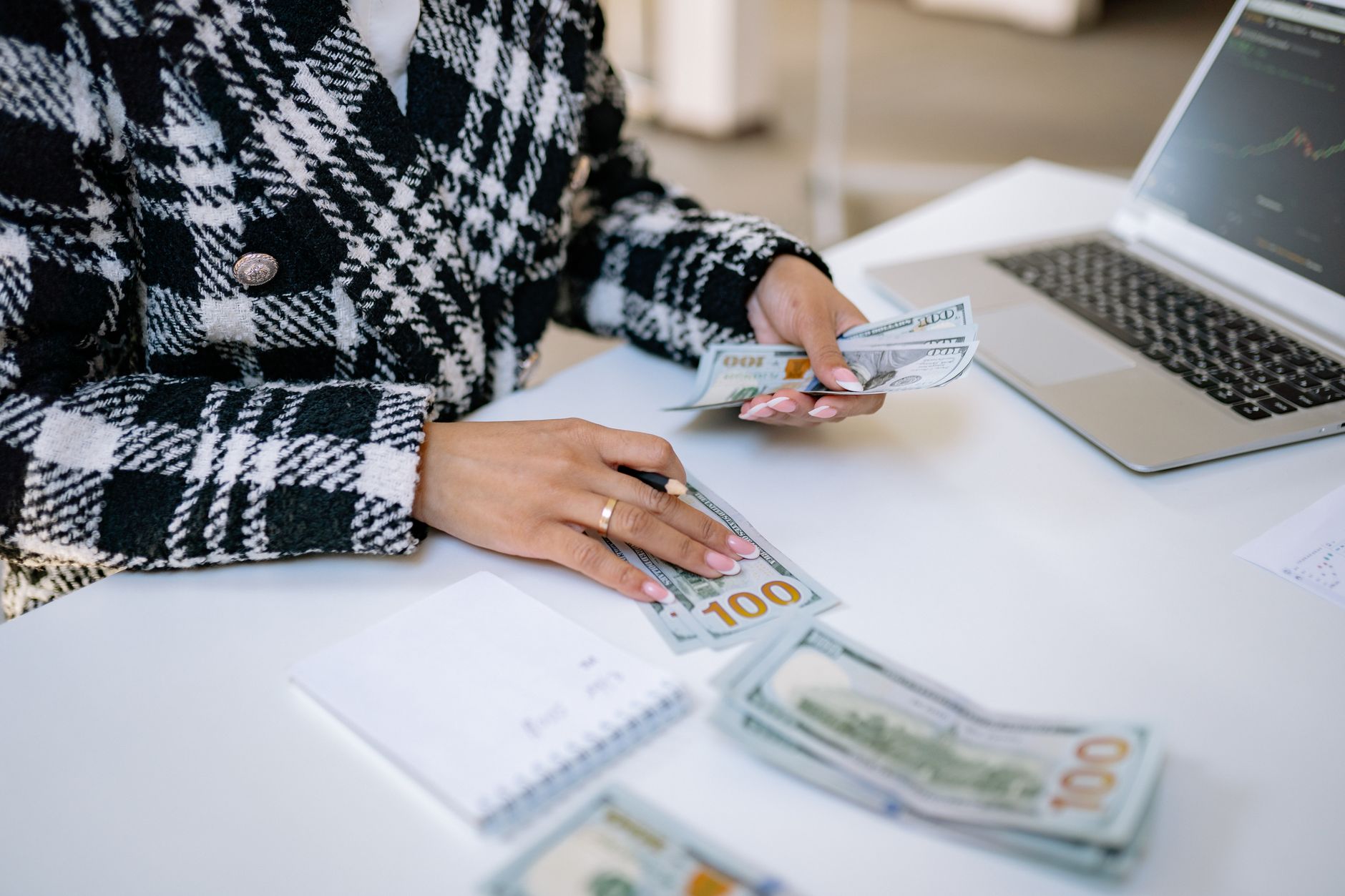 Business professionals reviewing quarterly earnings reports in a corporate setting
