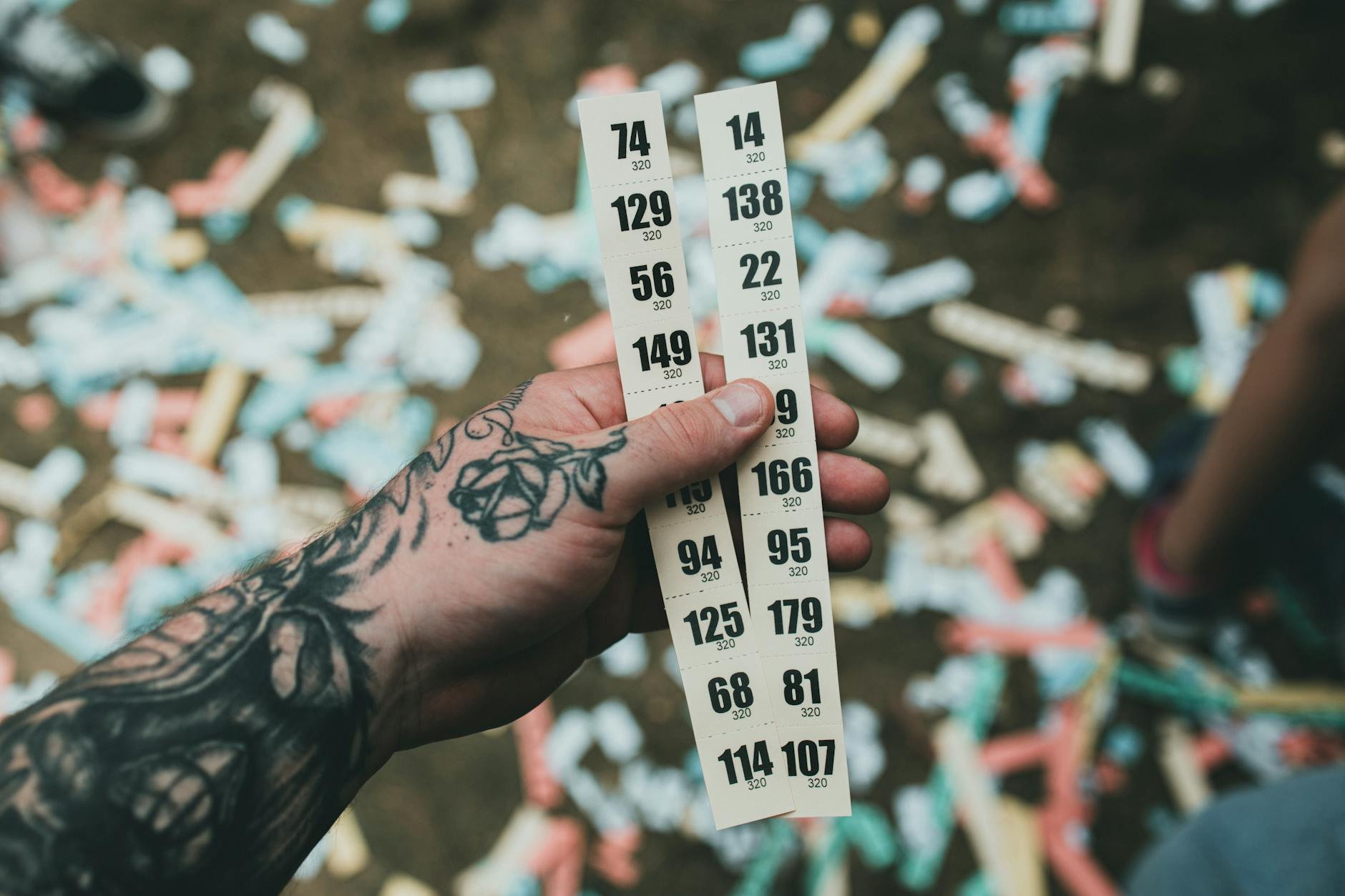 Horse racing betting tickets and cash on table