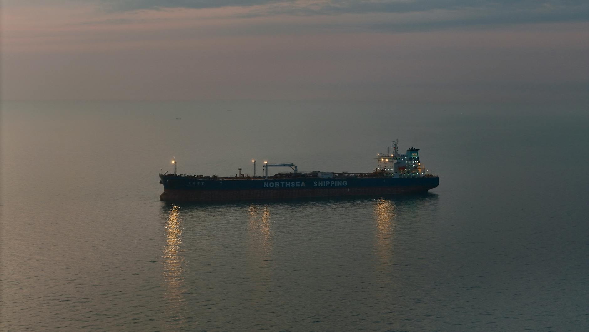 Oil tanker navigating open waters near strategic Gulf shipping lane