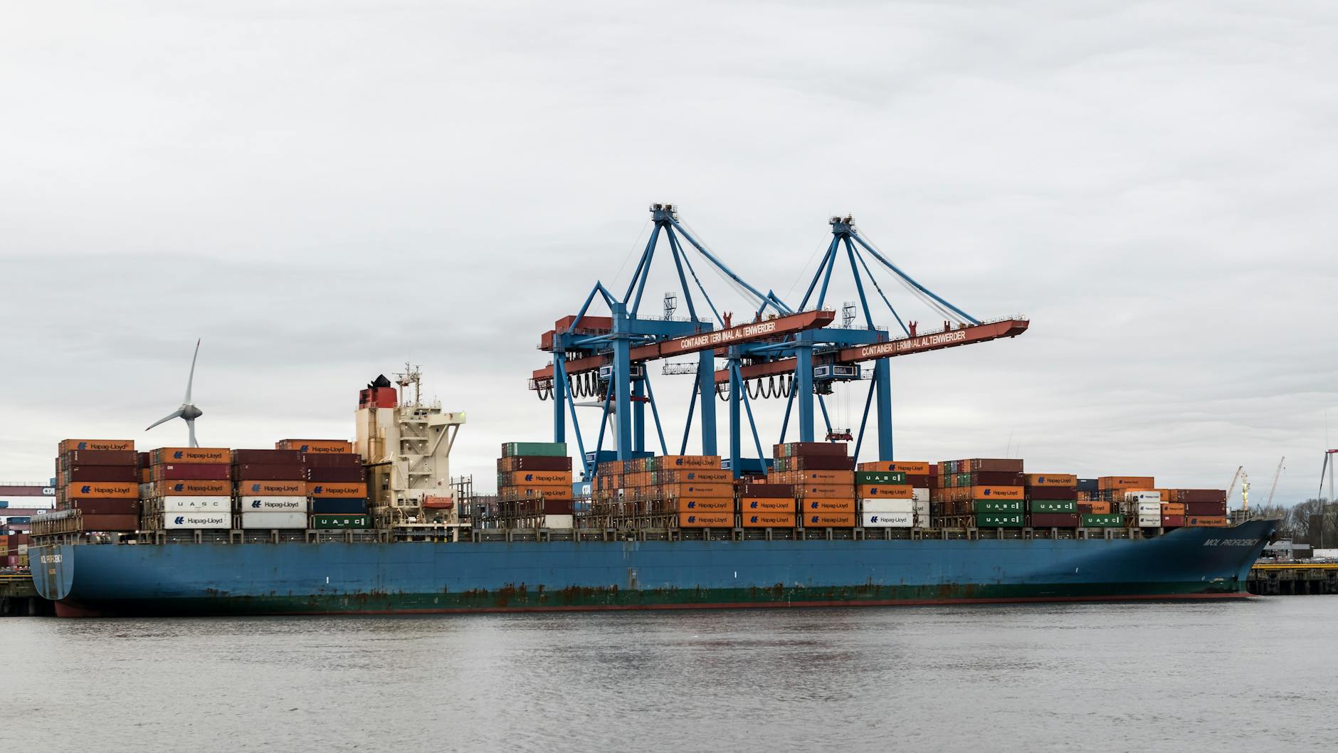 Large cargo vessel at sea highlighting global shipping operations