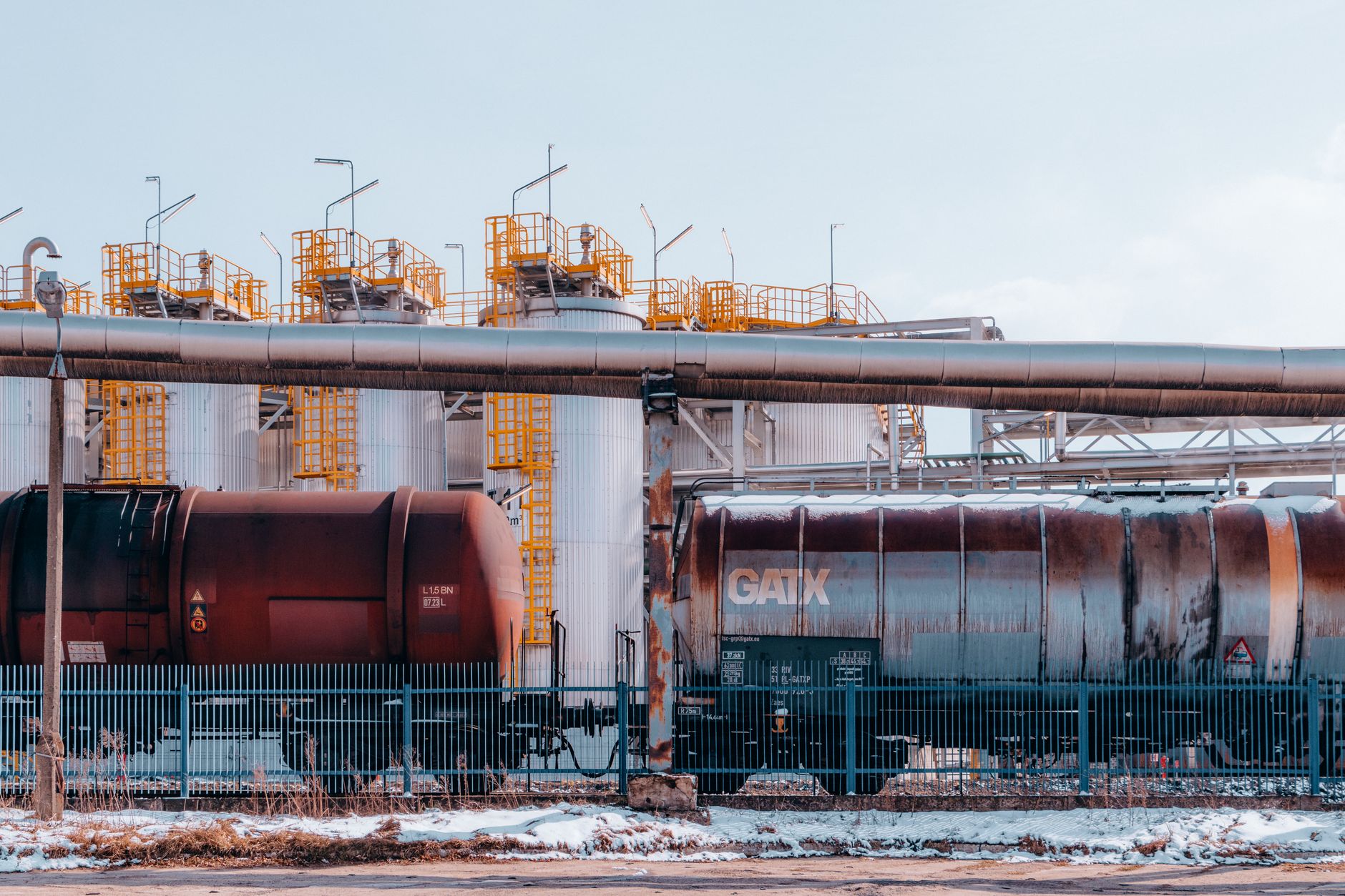 Oil pipeline infrastructure representing rising crude oil prices tied to Middle East ceasefire tensions