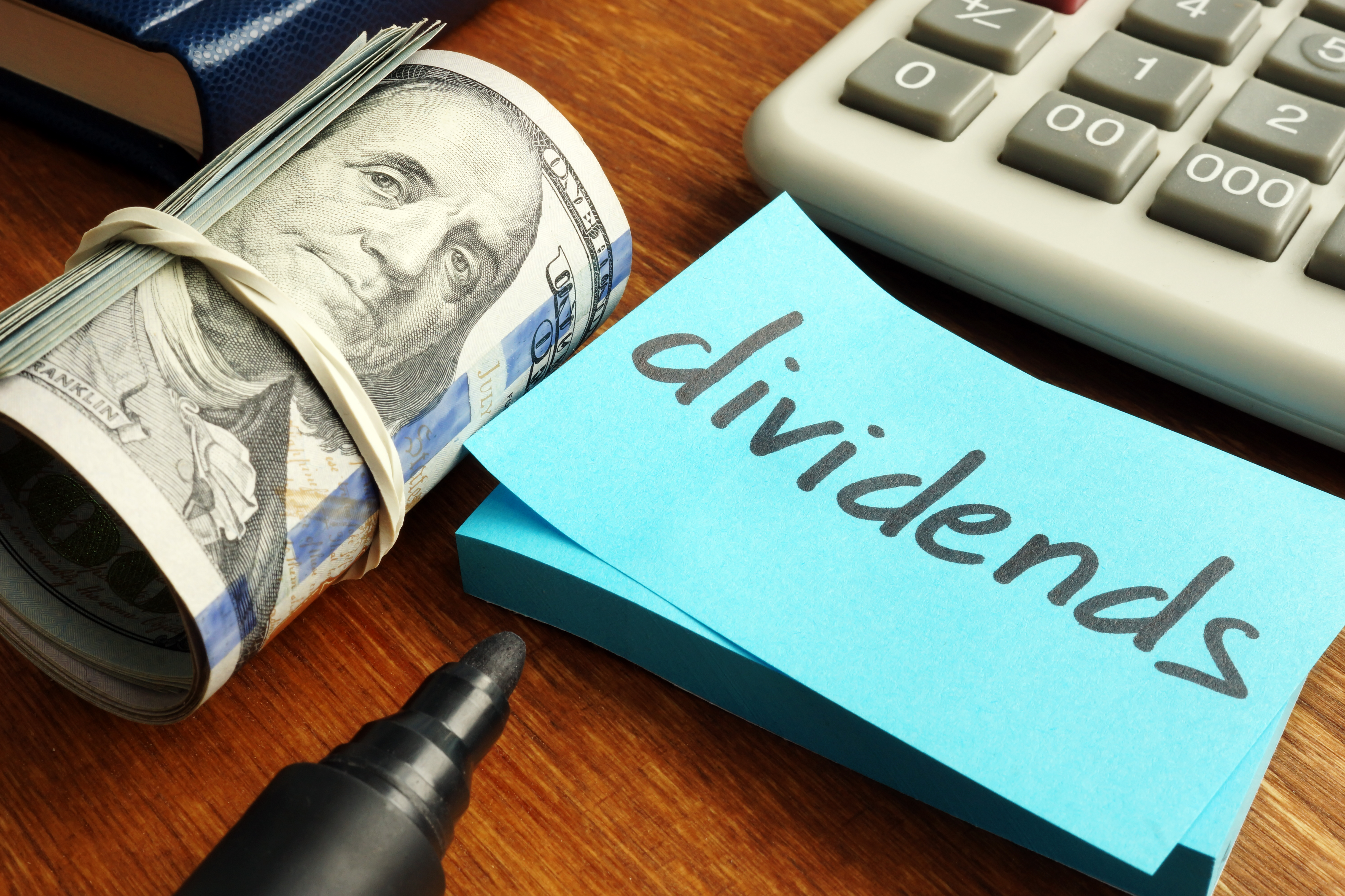 Stack of coins representing dividend payments and investment income