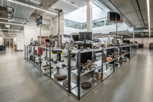 VW, Stellantis, Renault Push EU for Cleaner Made in Europe Label Workers on an automotive assembly line inside a European car manufacturing plant
