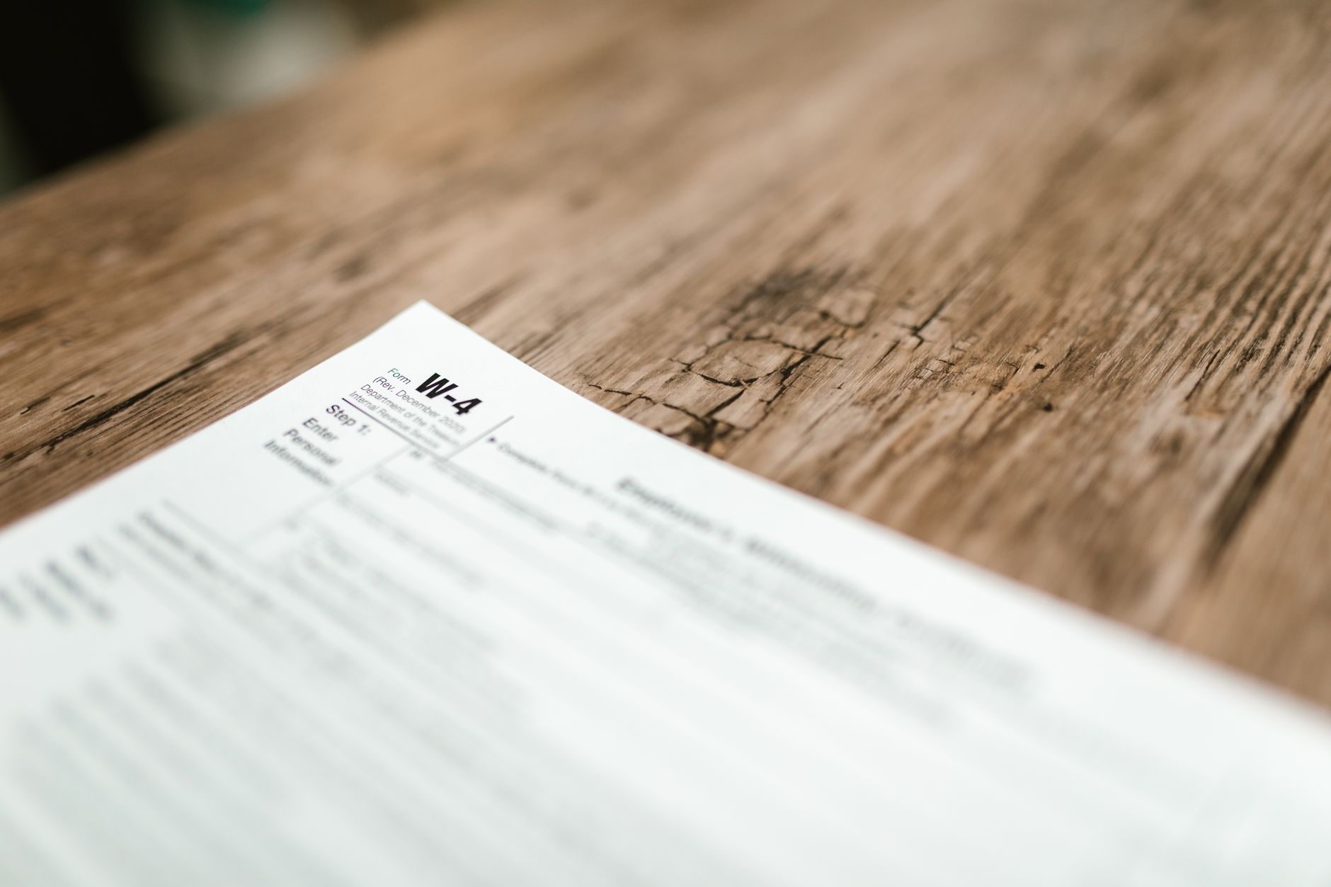 Close-up of financial documents and a calculator on a desk