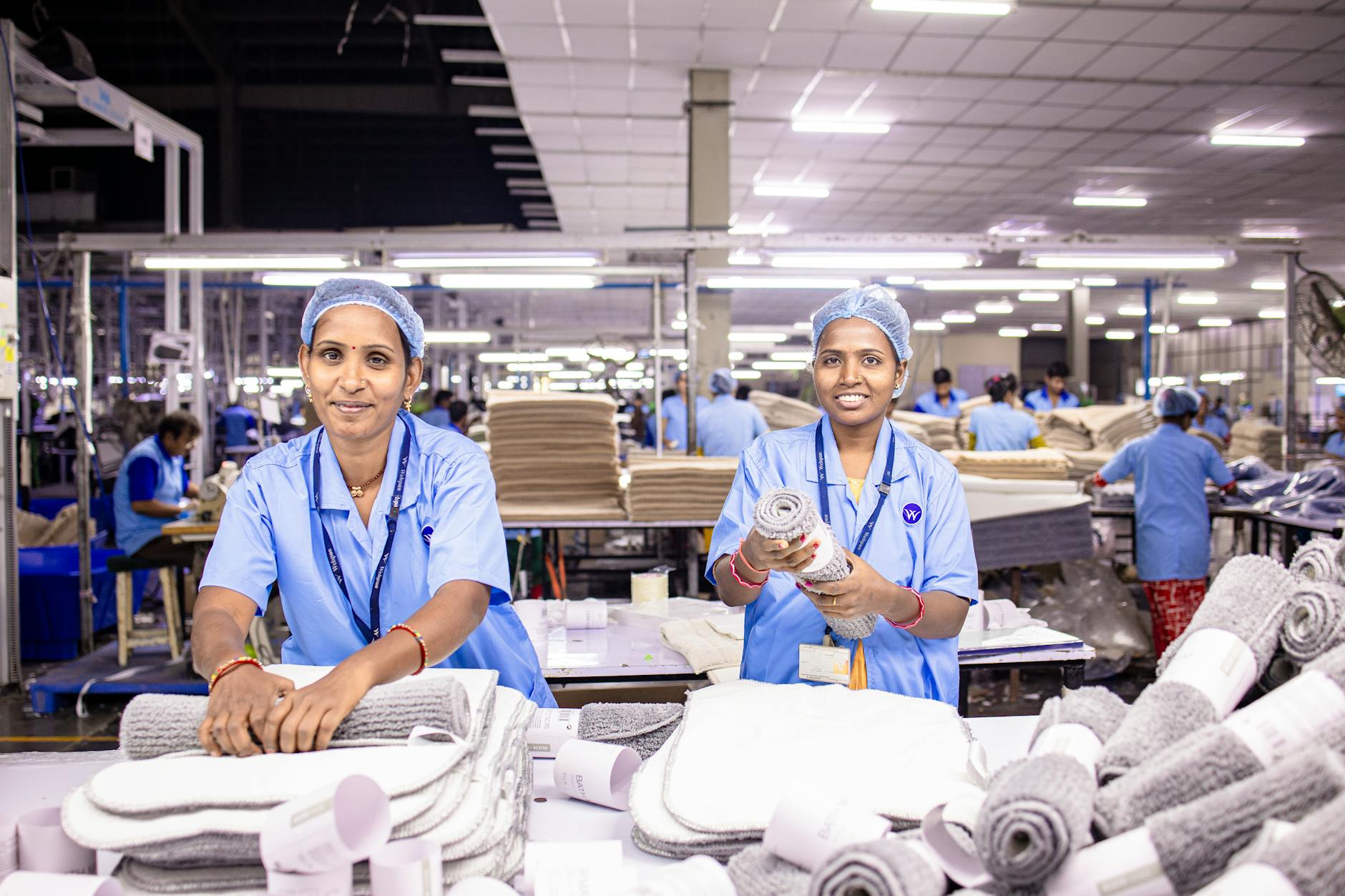 Workers on a manufacturing floor illustrating labor conditions in global supply chains