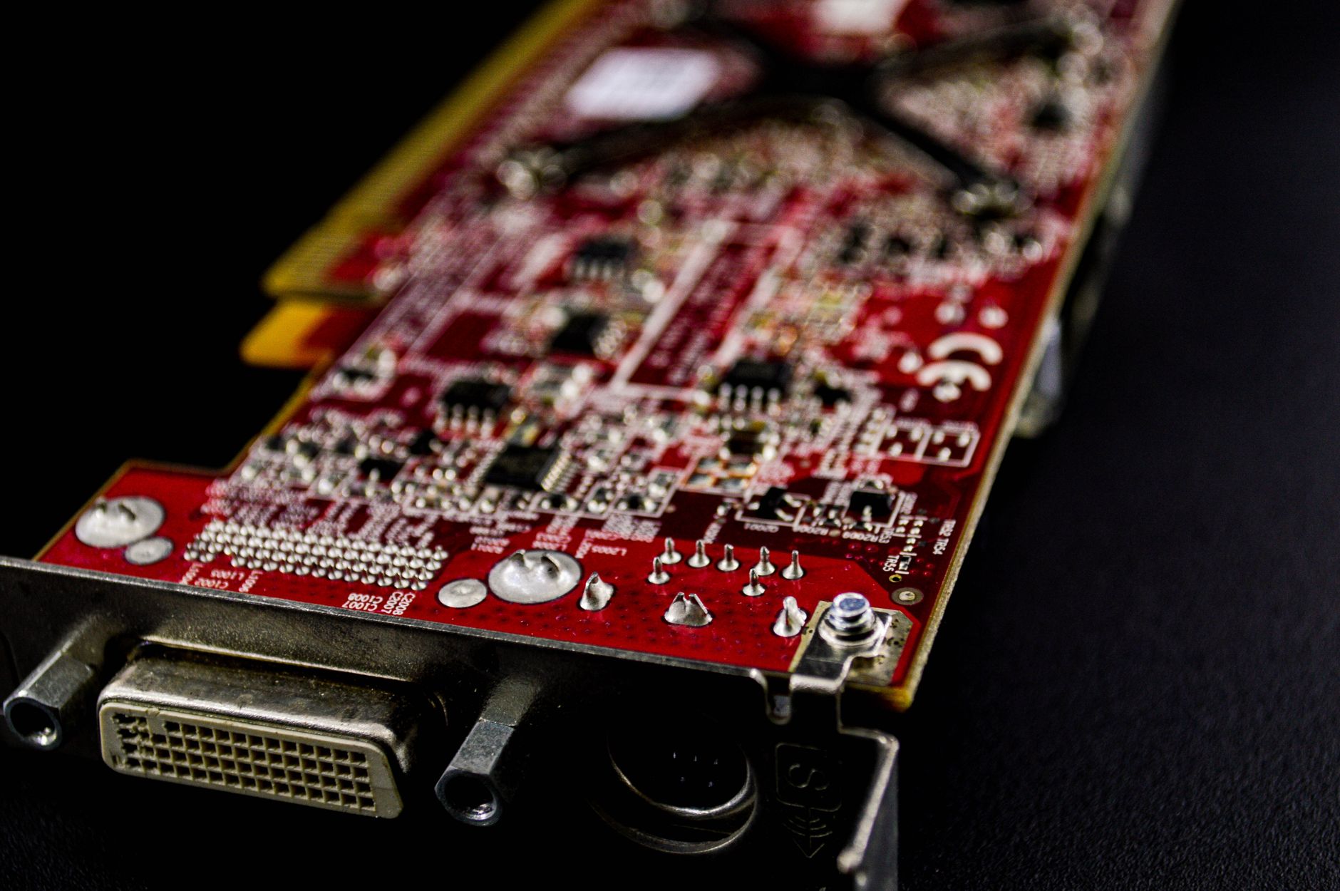Close-up of a semiconductor microchip on a circuit board representing chip sector pressure