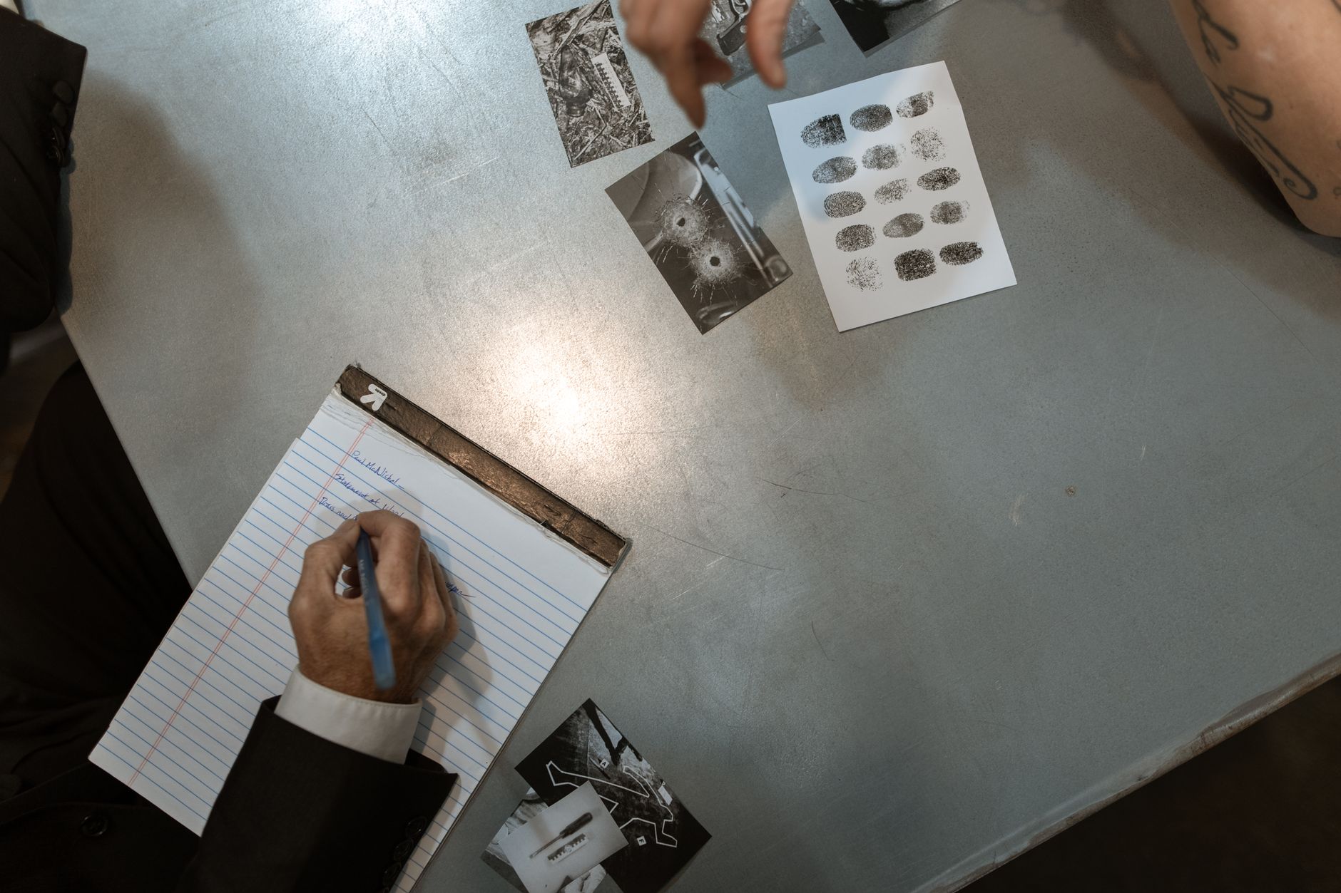 Federal documents and identification paperwork on a desk