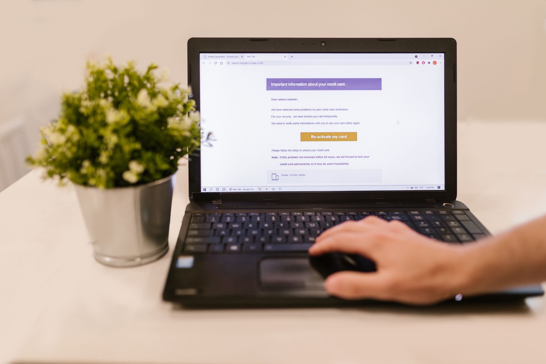 Person reviewing financial accounts on a laptop for signs of fraud
