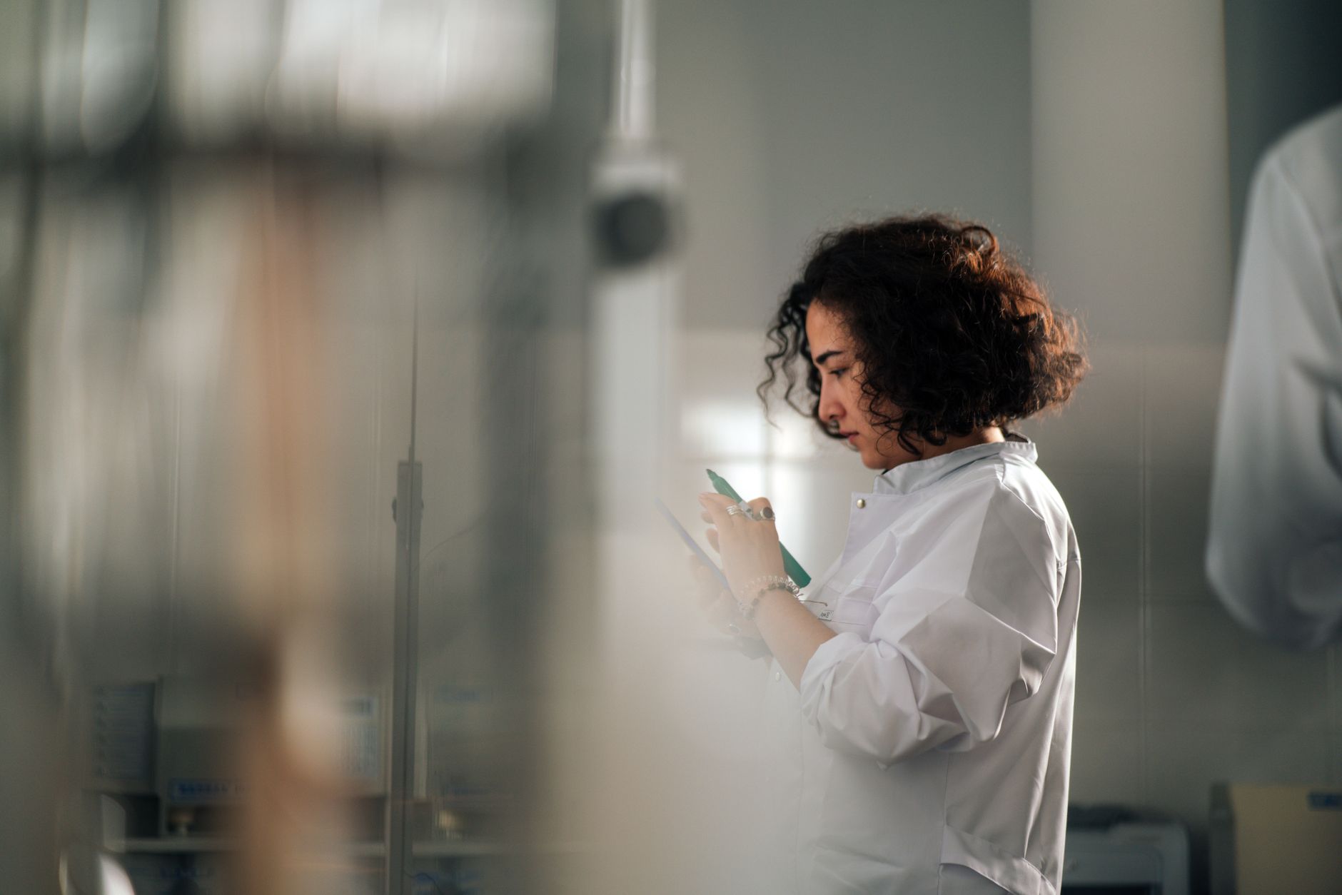 Researcher working in a pharmaceutical laboratory setting