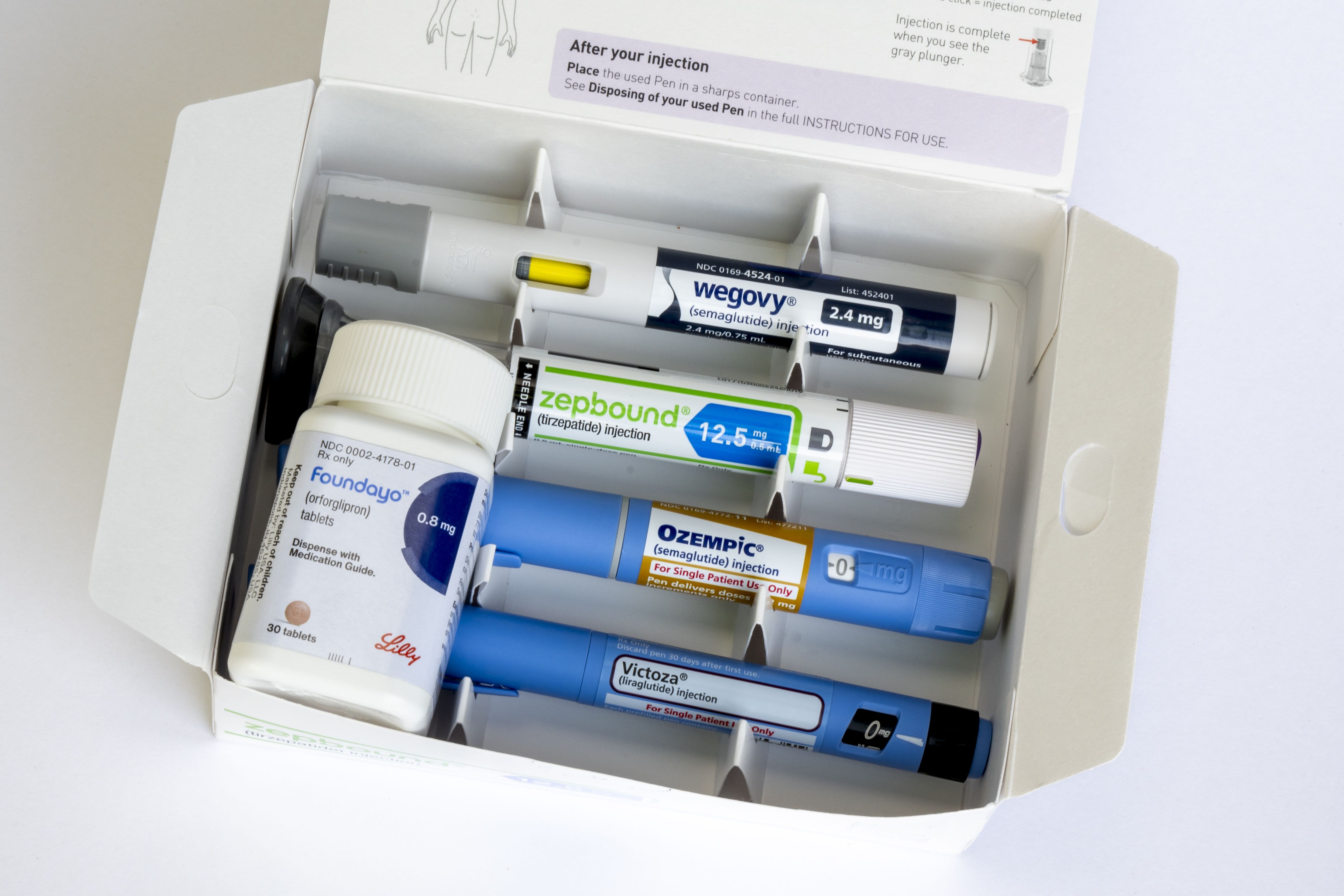 Elderly patient consulting with a doctor about medication options