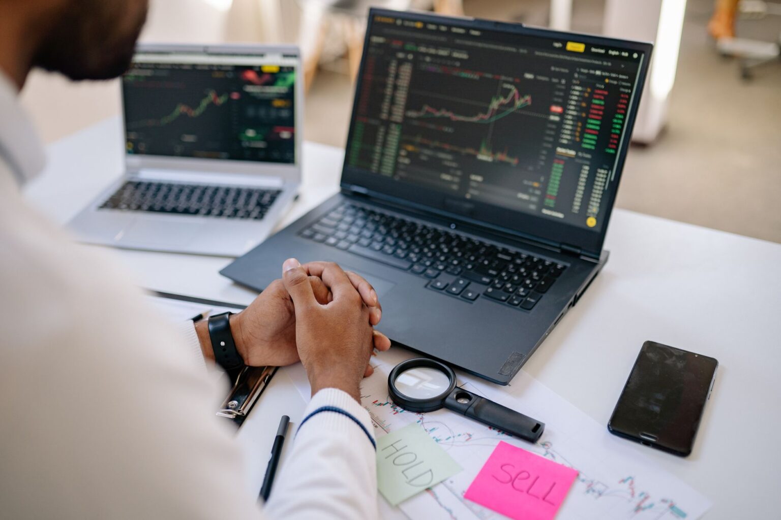 Bank of America Advises Investors on Bonds, Stocks Strategy Traders monitoring financial markets on screens at a busy trading floor