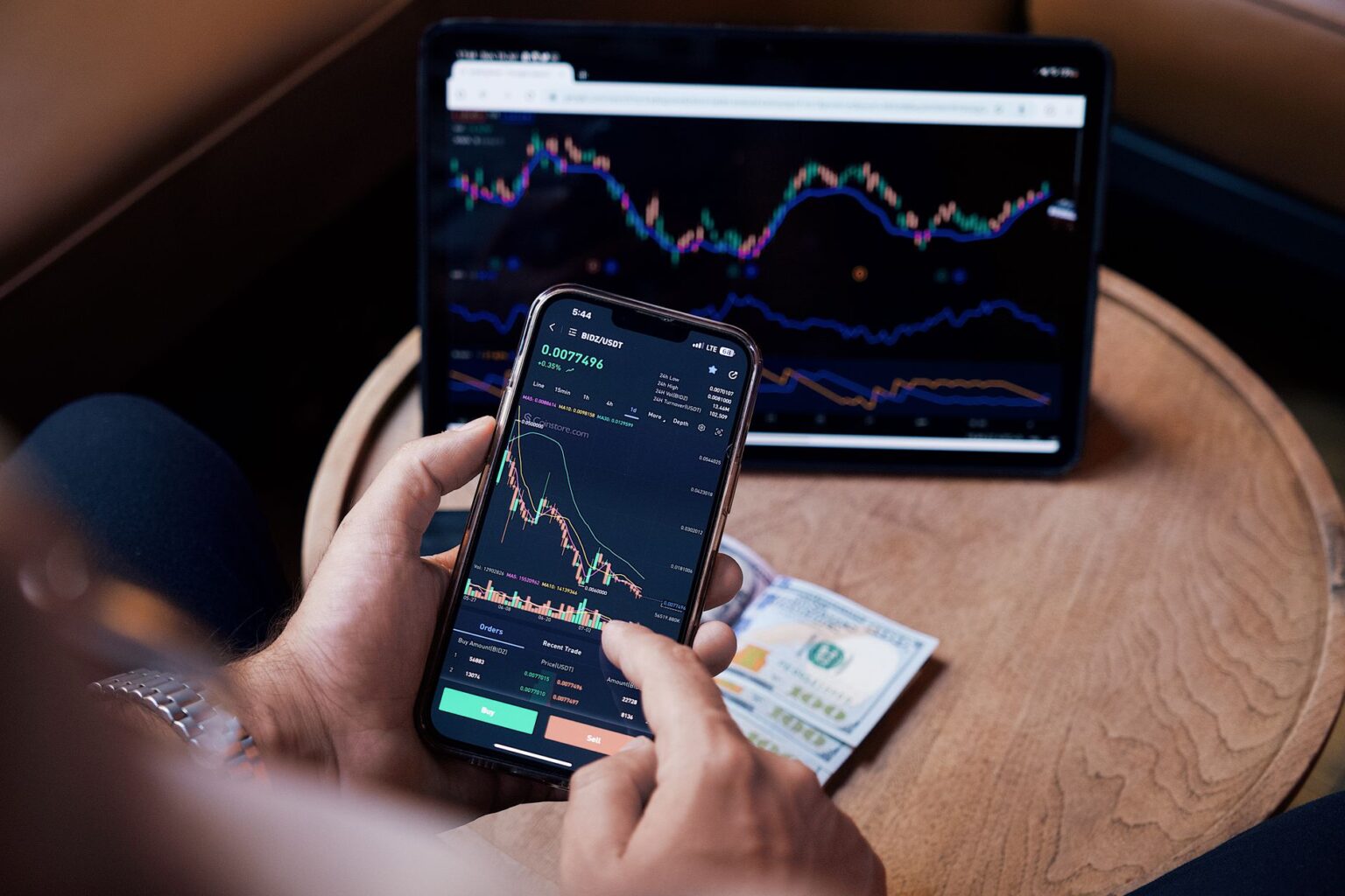 A Fund Manager Makes the Case for Tesla and SpaceX as Value Plays Investor reviewing financial charts on a computer screen