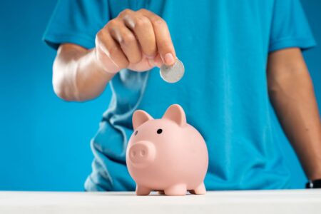 Your Brokerage Cash Is Probably Earning Less Than It Should Person reviewing financial account on laptop at a desk