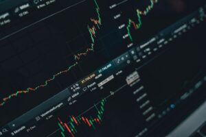 Tesla and Alphabet Drag Futures Lower as Oil Nears $100 Stock market futures displayed on a trading screen showing declining numbers