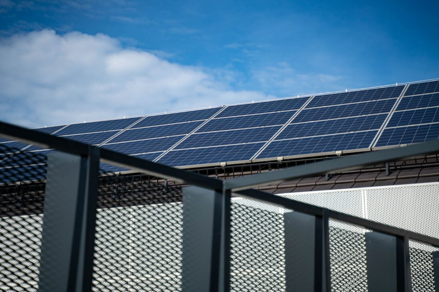Large solar panel array representing clean energy infrastructure investment